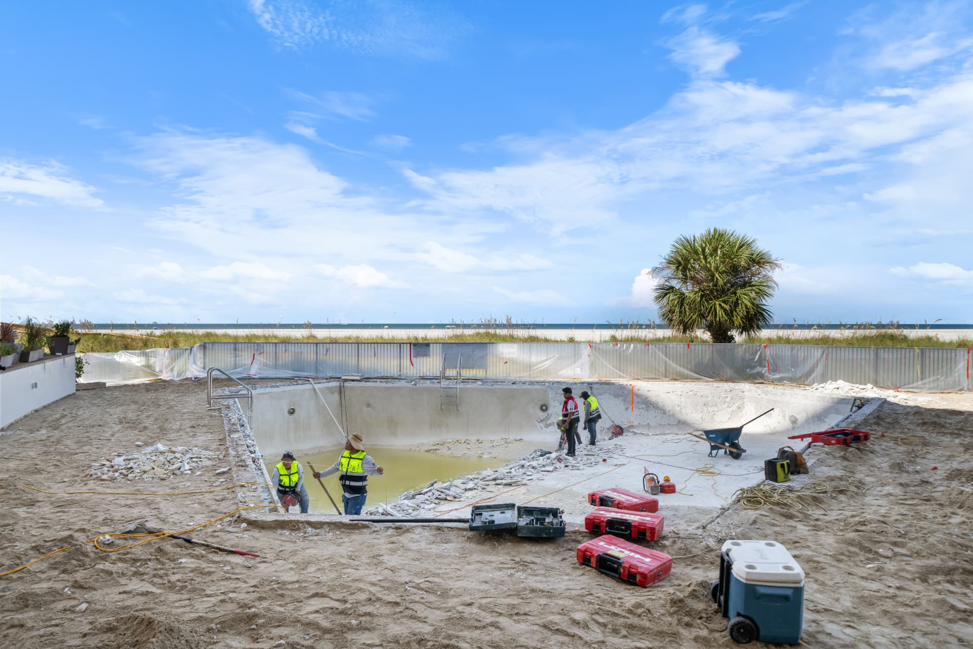 RL Poolscapes crew renovating a beachfront pool in Southwest Florida